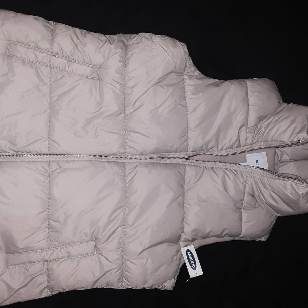 Cream colored vest